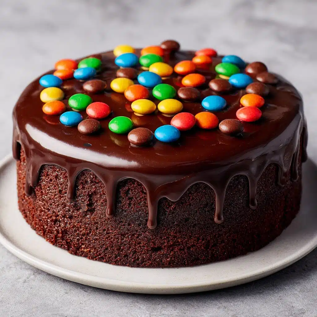 Candy-filled M\&M Drip Cake Recipe - Recipe Image
