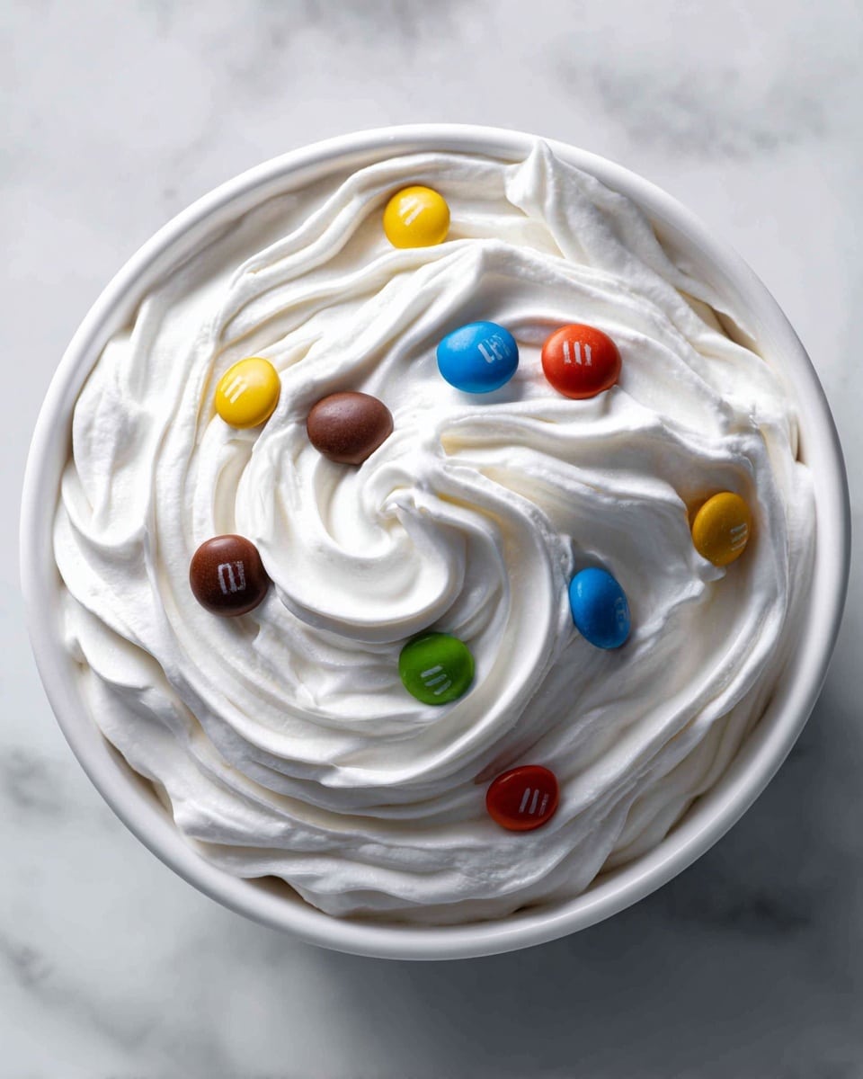 M&Ms Cool Whip and Pudding Frosting Recipe - Recipe Image