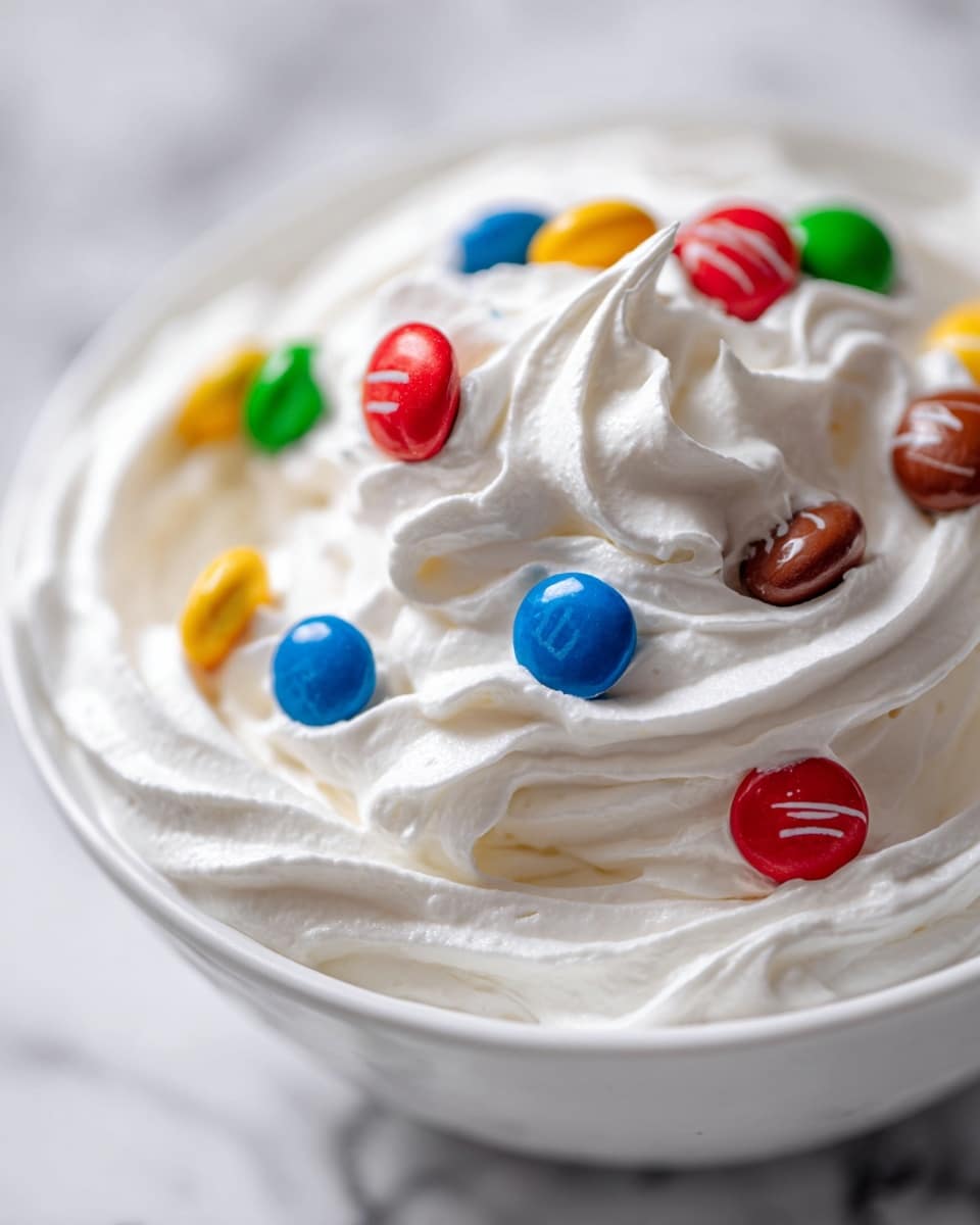 M&Ms Cool Whip and Pudding Frosting Recipe - Recipe Image