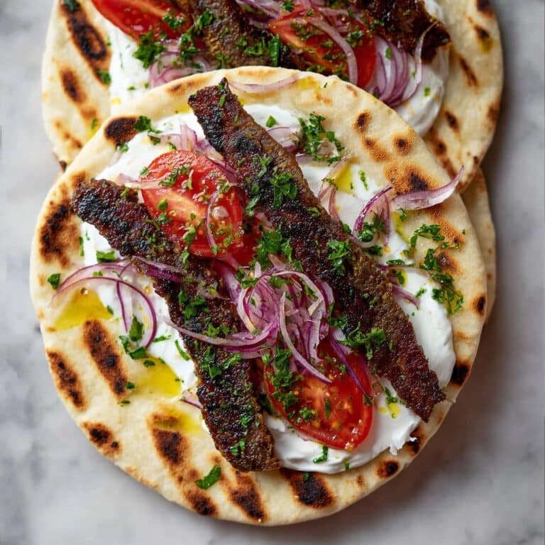 Juicy Oven-Baked Kebabs with Sumac Onions and Garlic Yoghurt Recipe